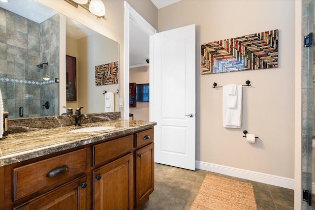 bathroom featuring vanity and an enclosed shower