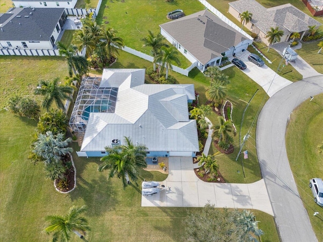 birds eye view of property with a residential view