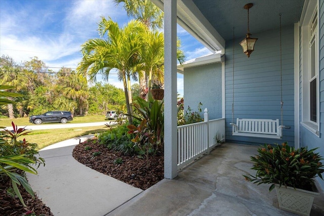 view of home's exterior with covered porch