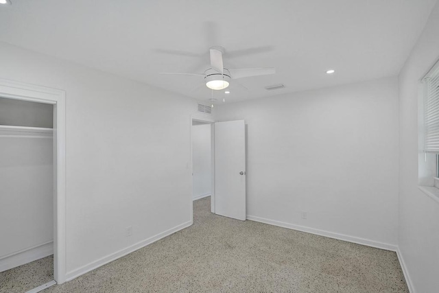 unfurnished bedroom featuring a closet and ceiling fan