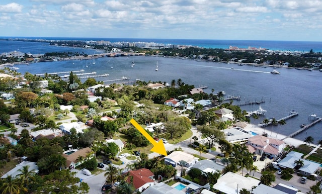 drone / aerial view with a water view