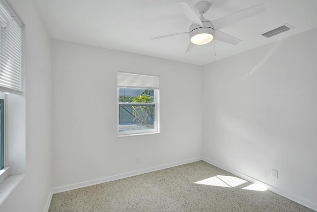 unfurnished room featuring ceiling fan