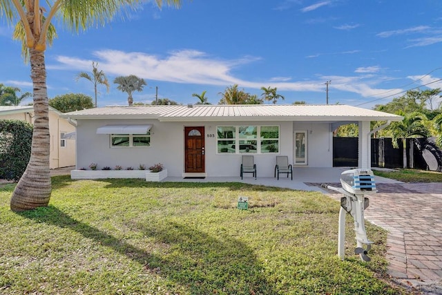 view of front of home with a front yard