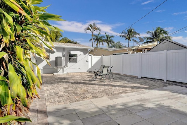 view of patio featuring central AC