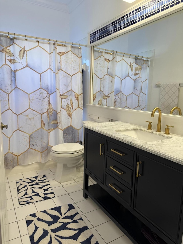 full bathroom featuring tile patterned floors, vanity, a shower with curtain, and toilet