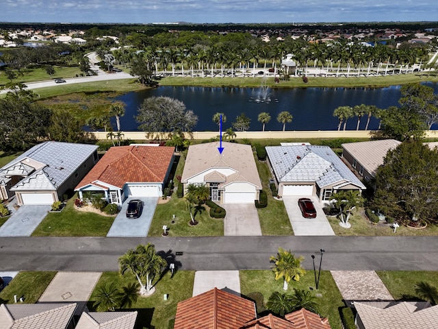 aerial view featuring a water view