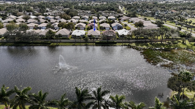 aerial view featuring a water view and a residential view