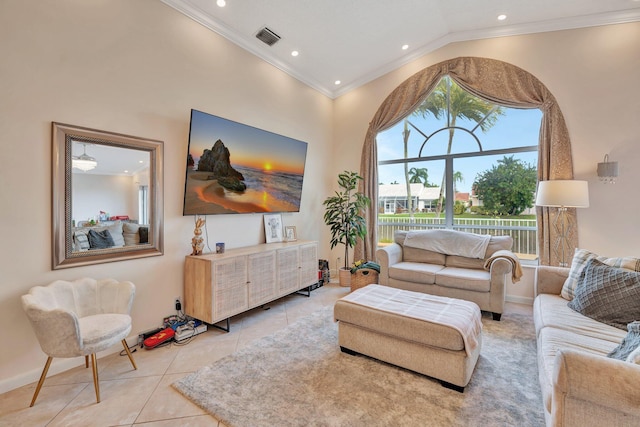 living room featuring visible vents, ornamental molding, light tile patterned flooring, high vaulted ceiling, and baseboards