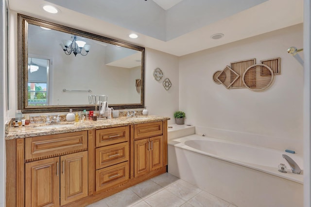 1048 Siena Oaks Cir E, Palm Beach Gardens, FL 33410 - bathroom with recessed lighting, an inviting chandelier, vanity, a bath, and tile patterned floors