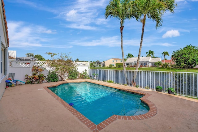 1048 Siena Oaks Cir E, Palm Beach Gardens, FL 33410 - view of swimming pool featuring a fenced backyard, a residential view, a fenced in pool, and a patio