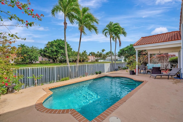 view of swimming pool with a fenced in pool, a patio area, and a fenced backyard