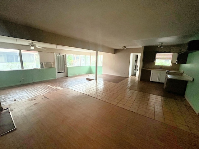 interior space featuring ceiling fan