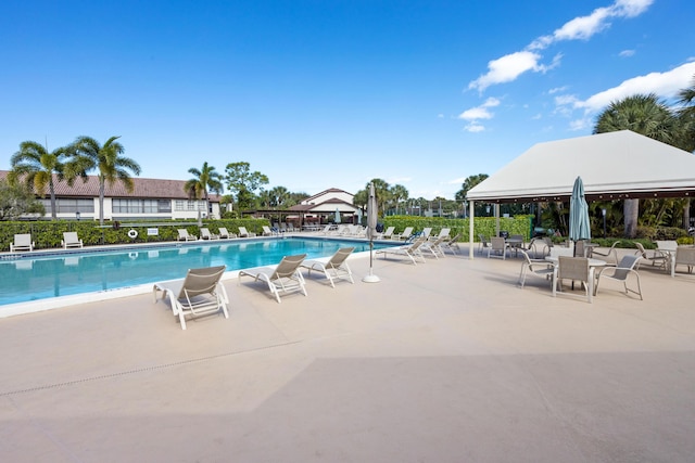 view of pool with a gazebo and a patio