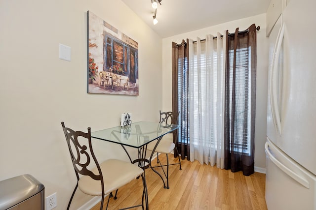 dining room featuring light hardwood / wood-style floors