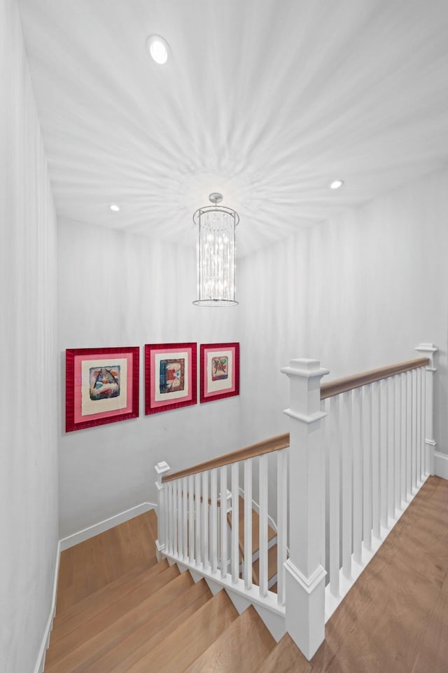 stairway with wood-type flooring