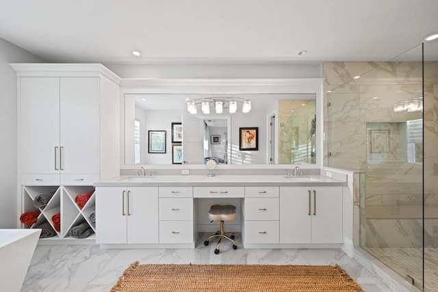 bathroom featuring vanity and a shower with door