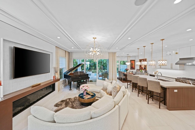 living room featuring sink, a notable chandelier, and light tile patterned floors