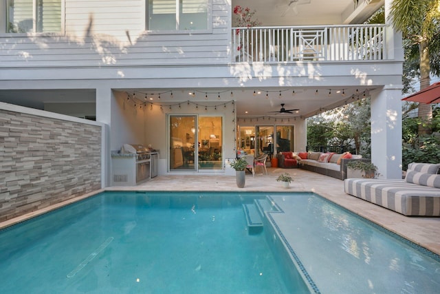 rear view of property with a balcony, area for grilling, an outdoor hangout area, and ceiling fan