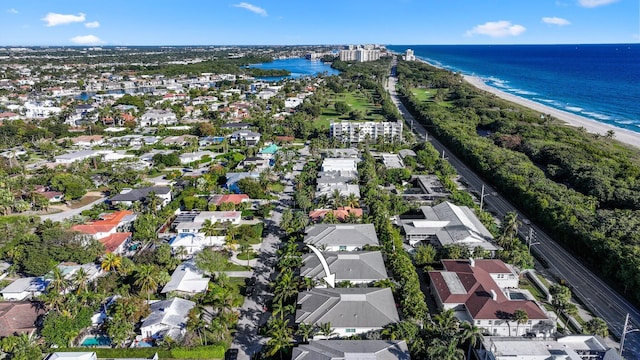 bird's eye view featuring a beach view and a water view