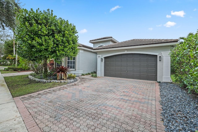 view of front of property featuring a garage