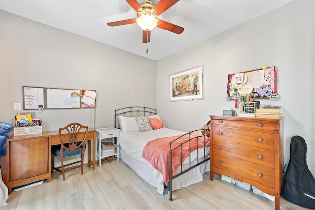 bedroom featuring light hardwood / wood-style flooring and ceiling fan