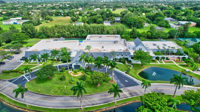 bird's eye view featuring a water view and a residential view