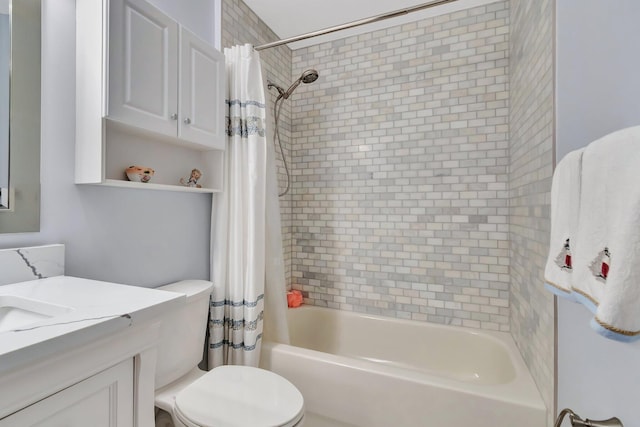 full bathroom featuring vanity, toilet, and shower / bath combo