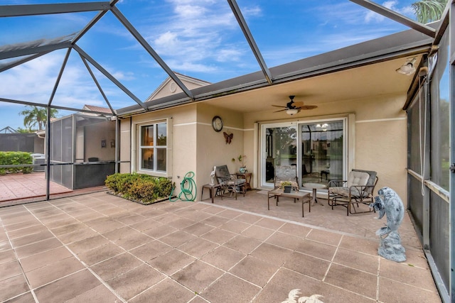 unfurnished sunroom featuring vaulted ceiling and ceiling fan