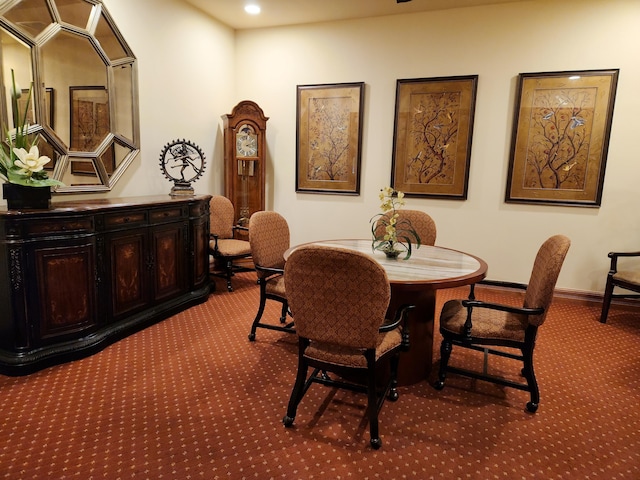 view of carpeted dining area