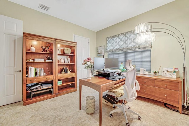 office area featuring visible vents and a chandelier