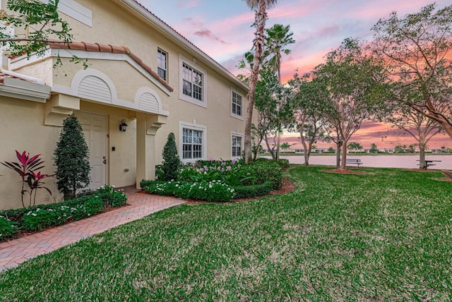 exterior space with a water view