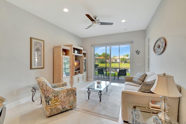 tiled living room featuring ceiling fan