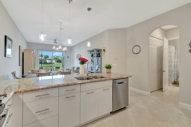 kitchen with pendant lighting, sink, dishwasher, white cabinetry, and light stone counters