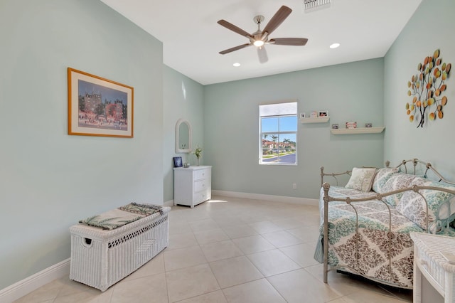 tiled bedroom with ceiling fan