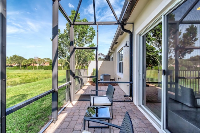 unfurnished sunroom with a wealth of natural light