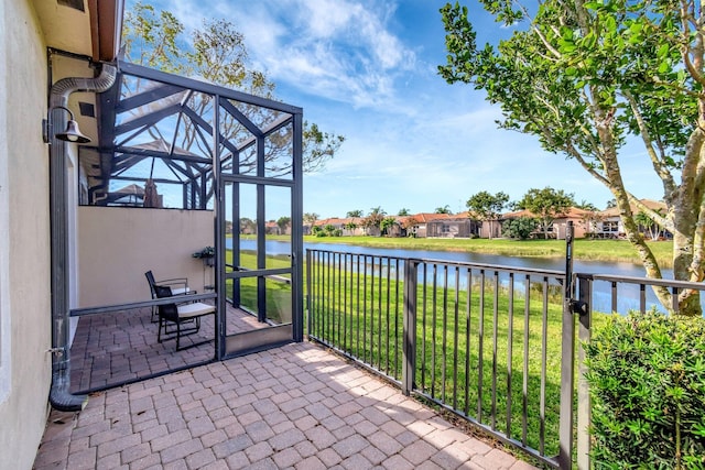 view of patio featuring a water view