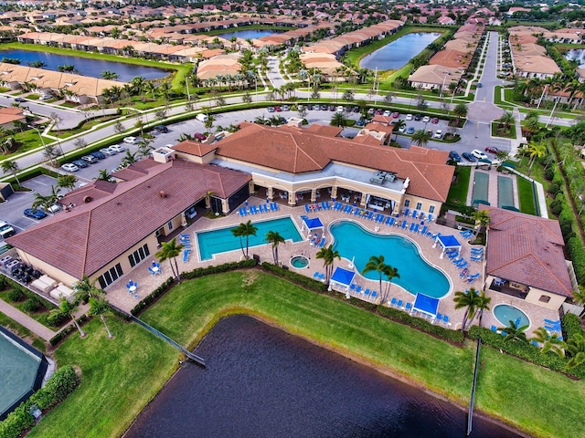 drone / aerial view with a water view