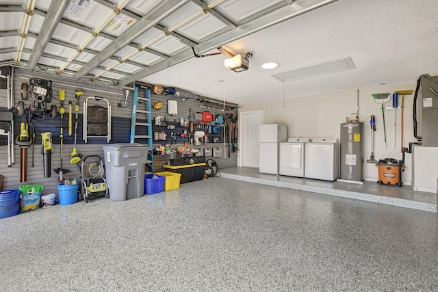 garage with white refrigerator, a garage door opener, washing machine and clothes dryer, and water heater