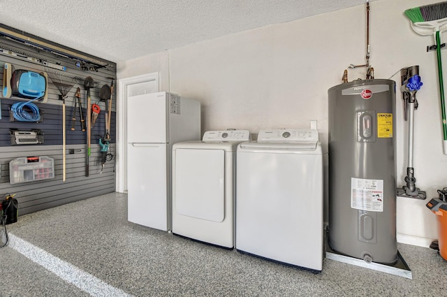 clothes washing area with water heater, a textured ceiling, and independent washer and dryer