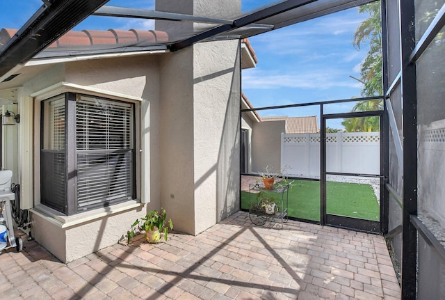 view of property exterior featuring a patio