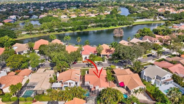 birds eye view of property featuring a water view