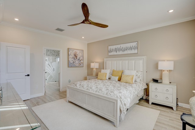 bedroom featuring ornamental molding, light wood-type flooring, and ceiling fan