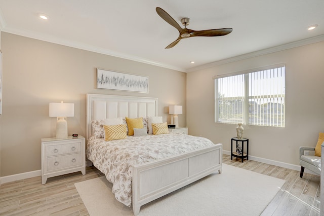 bedroom featuring crown molding, ceiling fan, and light wood-type flooring