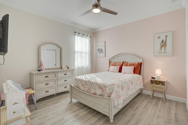 bedroom featuring crown molding, ceiling fan, and light hardwood / wood-style floors