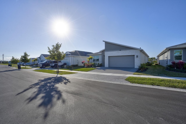 single story home with a garage