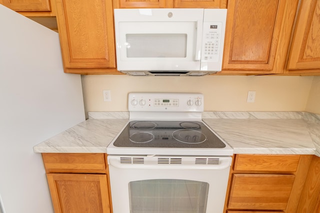 kitchen with white appliances