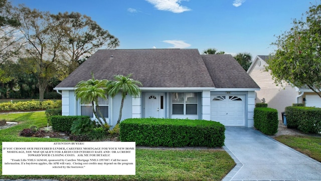 view of front of home with a garage