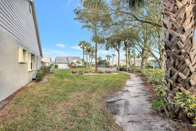 view of yard featuring a residential view