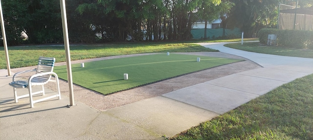 view of home's community featuring a lawn