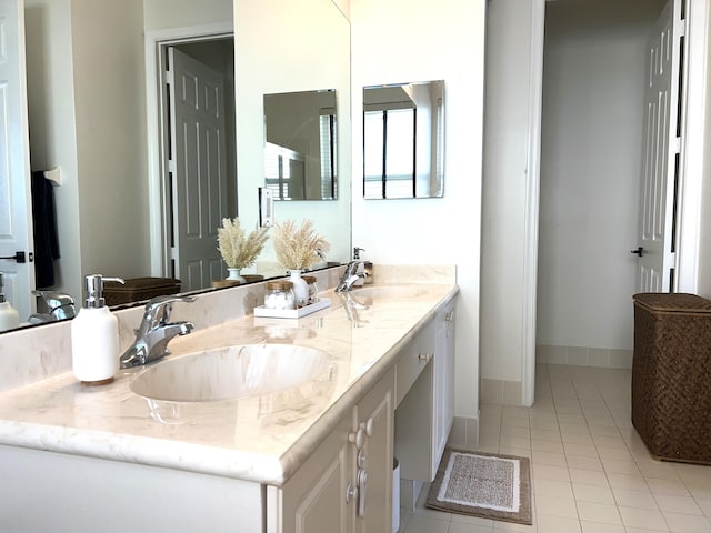 bathroom with vanity and tile patterned floors